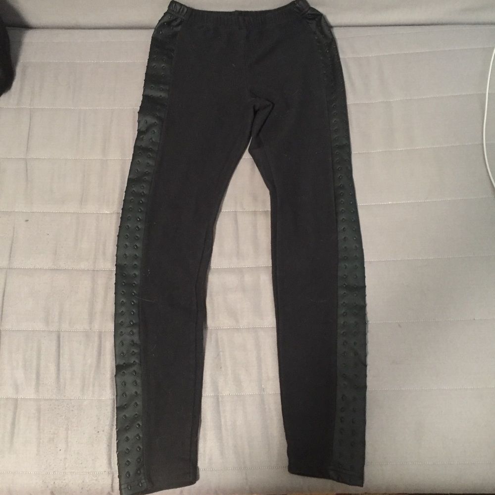 Black leggings. Faux leather up sides.